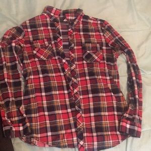 Button down, long sleeve shirt.